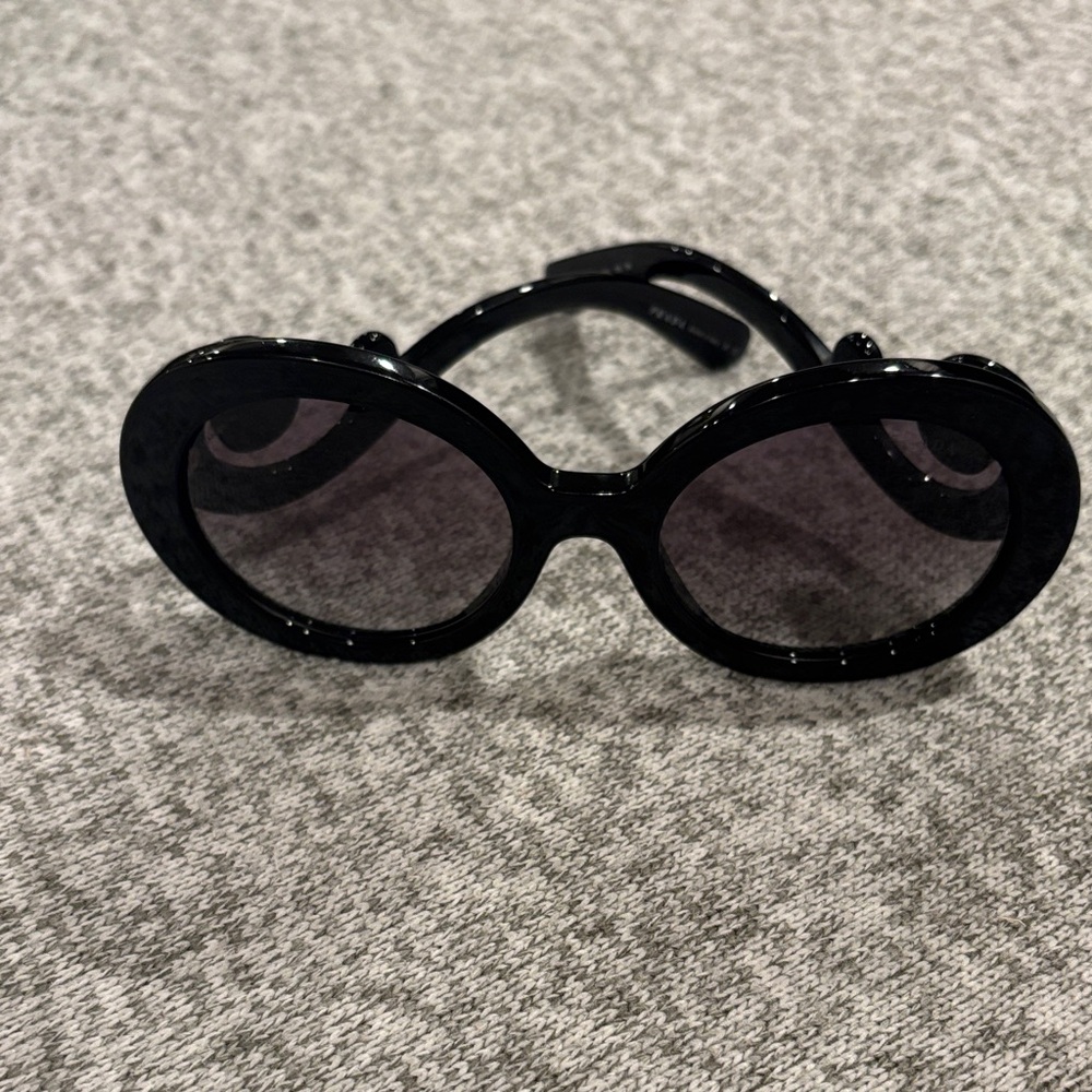Prada Glossy Black Oval Sunglasses